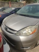 Silver Toyota Sienna 